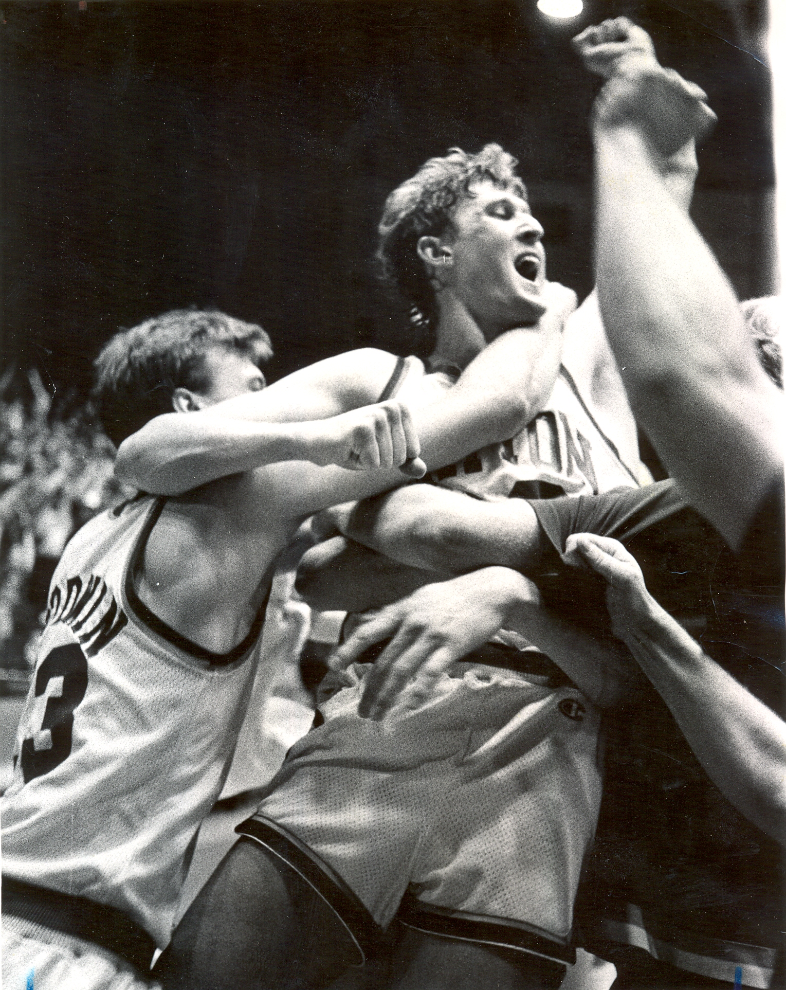 Feb. 19, 1984. UD Upset. Ed Young is hoisted and surrounded by his teammates after he scored the game winning basket in the Flyers upset of 3rd ranked DePaul. 72-71. On the left side is Damon Goodwin. 