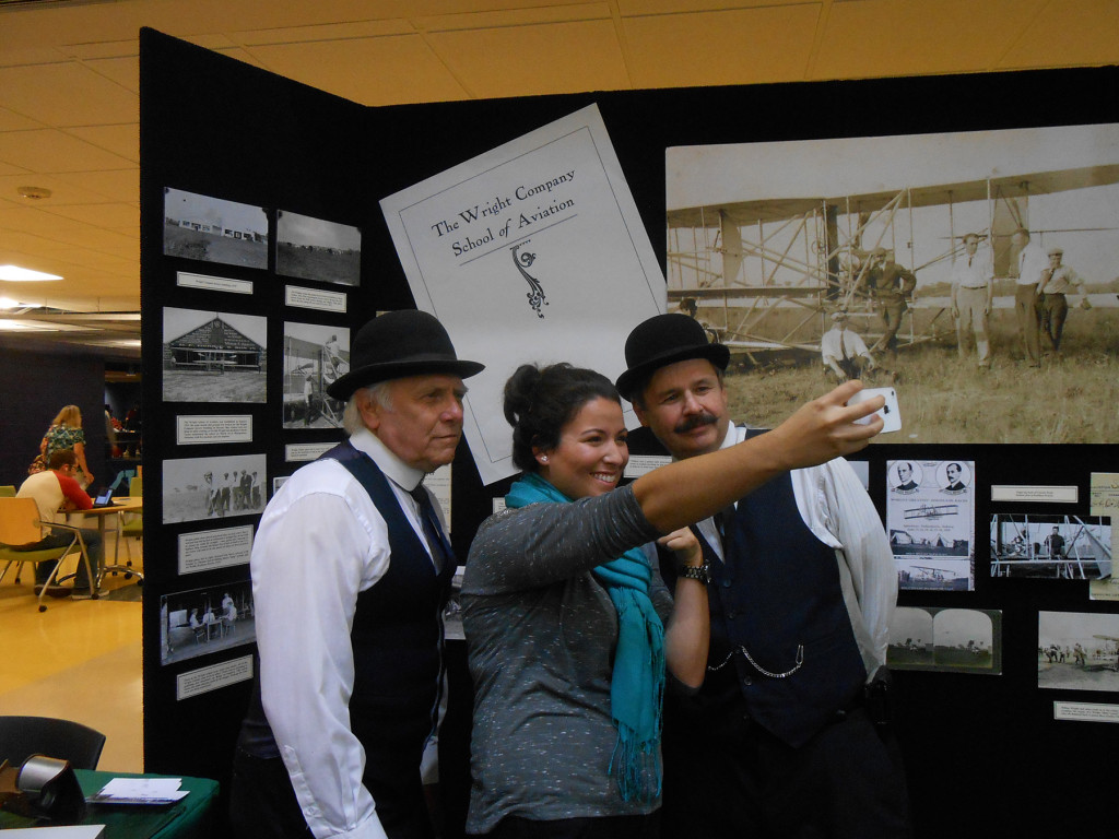 Susie Lang with Wright brother impersonators Tom Benson and Roger Storm, who work at the NASA Glenn Research Center in Cleveland, Oct. 2, 2014