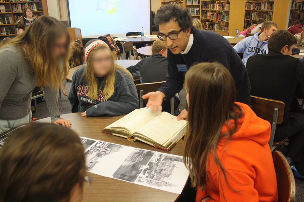 Gino Pasi instructs some Fairborn High School students in the value of archival materials, Dec. 12, 2014.