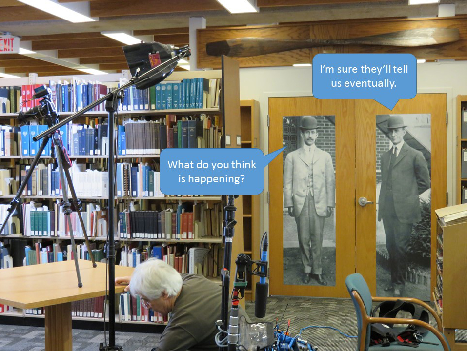Our new life-size photos of Orville (left) and Wilbur Wright oversaw the proceedings. (The cutouts are from photo # ms1_23_1_22 at Bollee Gardens, 1909)
