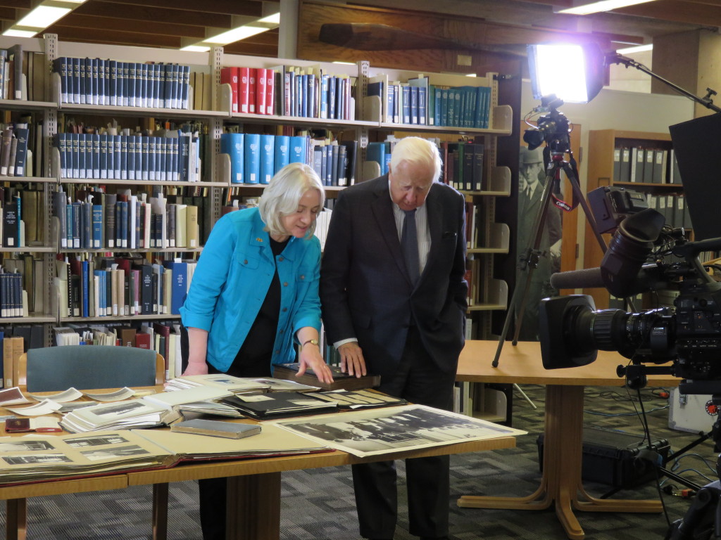 Dawne Dewey, Head of Special Collections & Archives, discussing with David McCullough some of the Wright materials laid out for the interview.