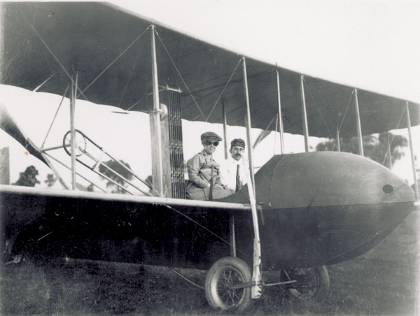 Katharine Wright, wearing flying goggles, and Orville Wright sitting in a Wright Model H Flyer, 1914. (photo ms1_20_6_19)