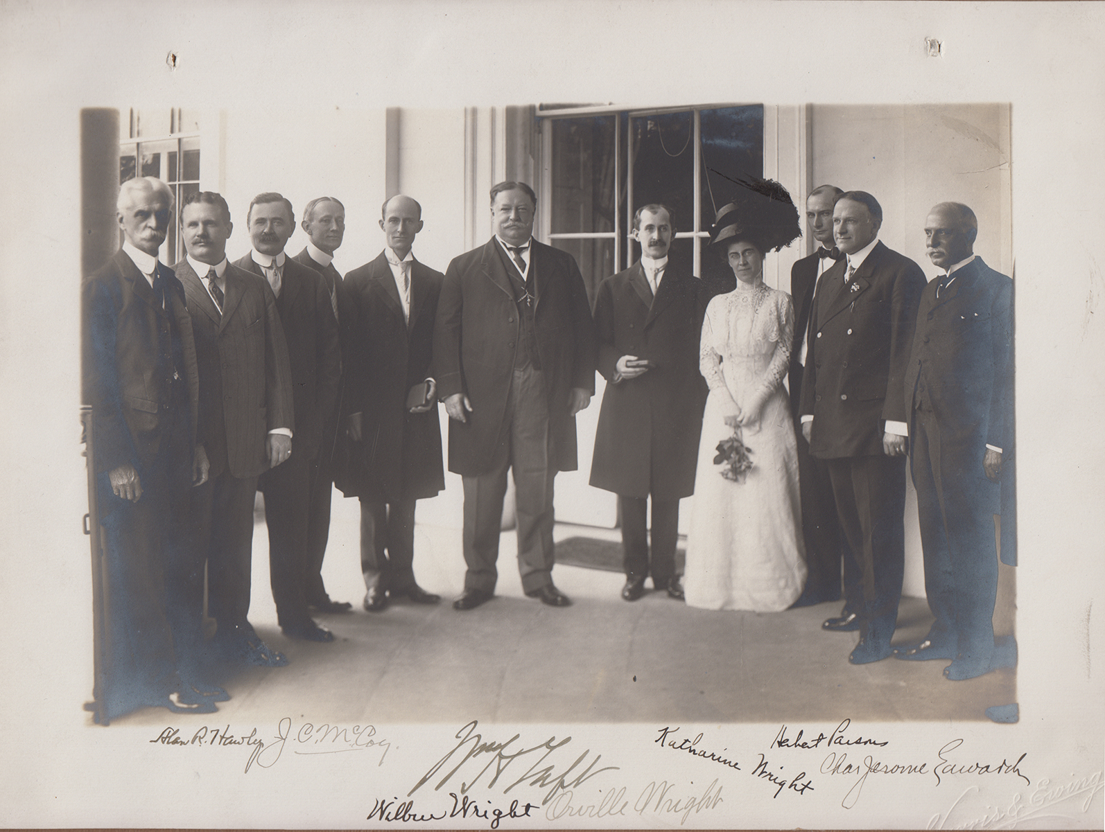 President Taft, center, with Wilbur Wright (left) and Orville Wright and sister Katharine (right) and other important gentlemen, at the White House, June 10, 1909. From the Aero Club of America scrapbook, MS-1 Wright Brothers Collection.