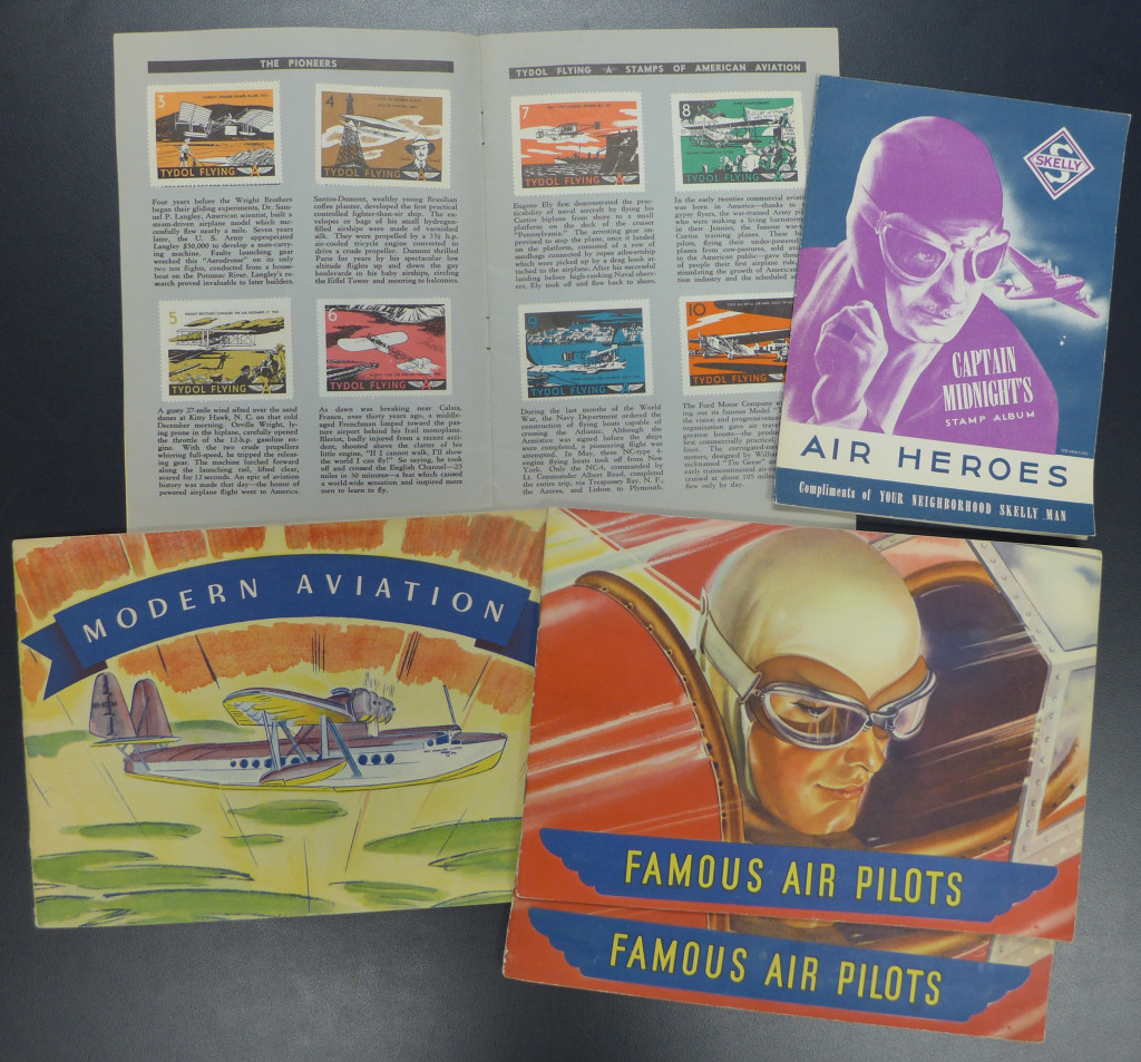 Aviation trade stamp albums from Tydol, Skelly, and Heinz