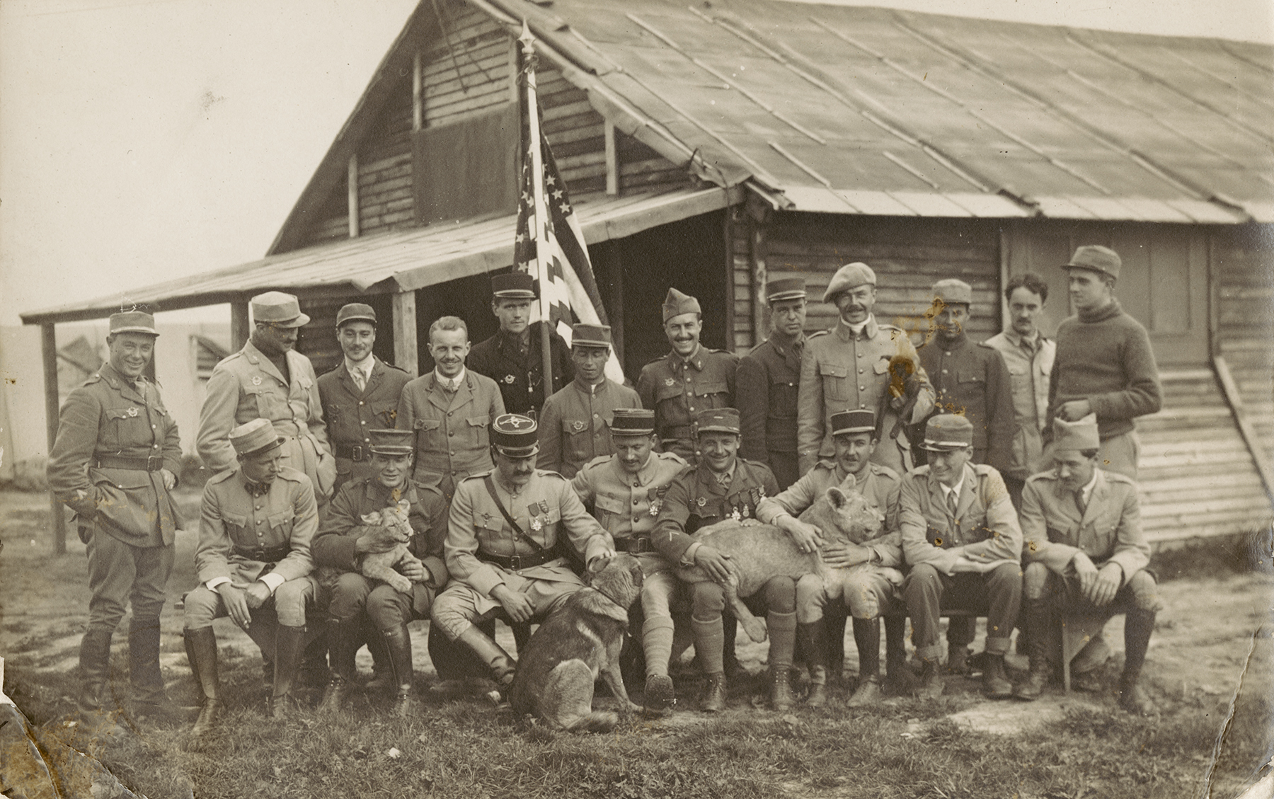 Members of the Escadrille Lafayette, along with their mascots, lions named Whiskey and Soda (from MS-502 Raoul Lufbery Collection)