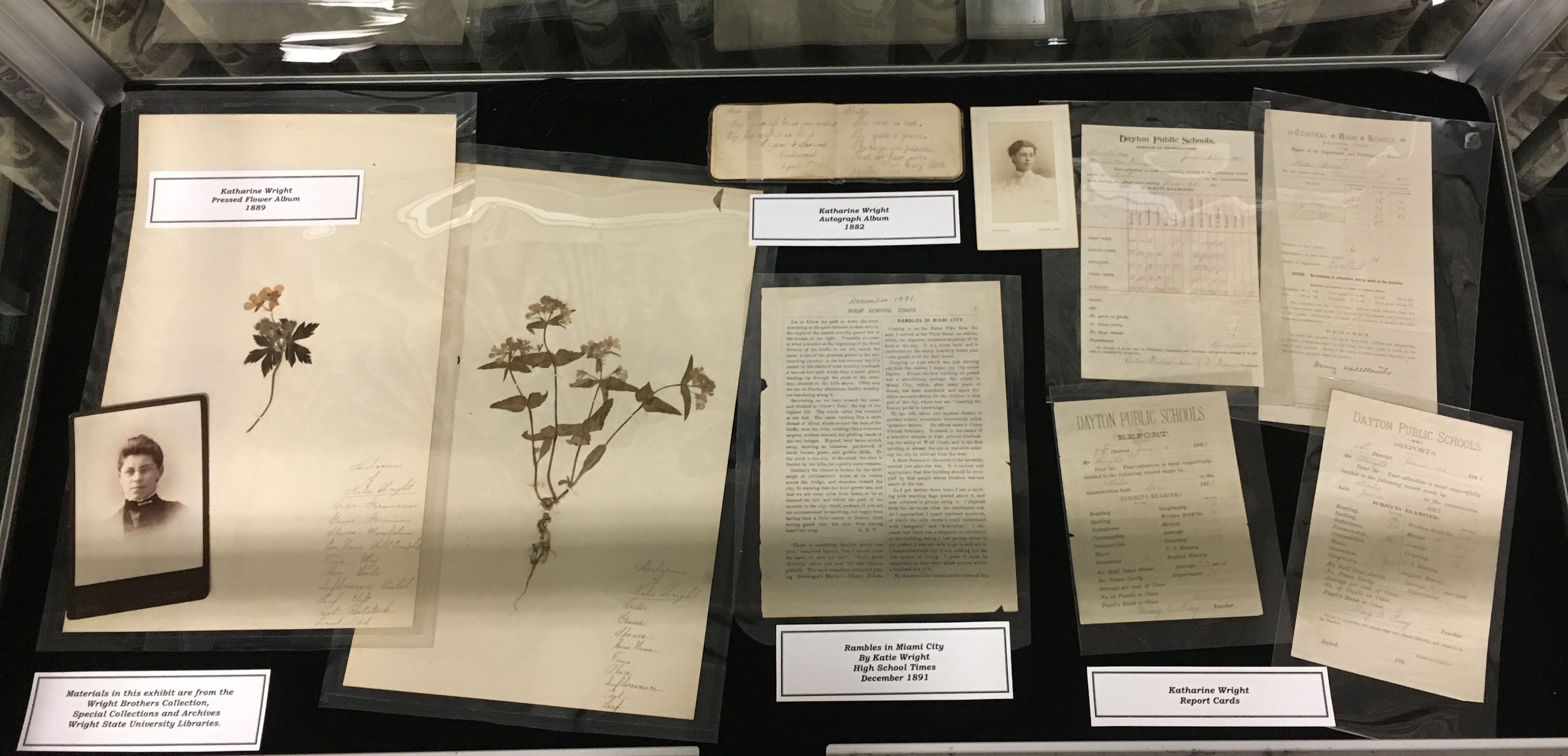 Katharine Wright's pressed flowers and report cards, WSU Special Collections & Archives