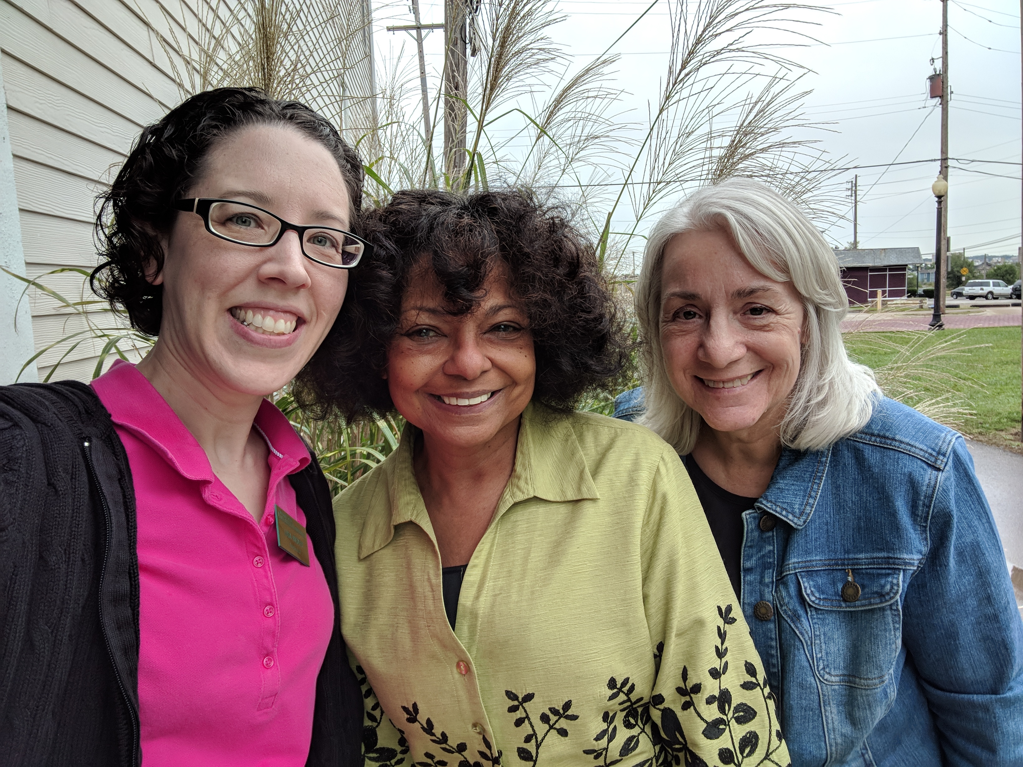 Archivists Lisa Rickey (left) and Dawne Dewey (right), with Rhine McLin (center), in September 2018, during the collection pick-up.