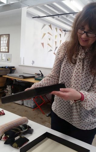Conservator Laura Moeller shows us the newly treated Ft. Myer Album.