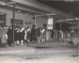 B&G (Building & Grounds) Publicity Traffic Congestion, 6:15 A.M. employees of Wright and Patterson Fields waiting to board bus [107437], January 28, 1943 (SC-317, item 4)
