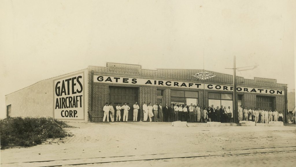 Gates Aircraft Corporation exterior with employees (ms646_sb3_p44)