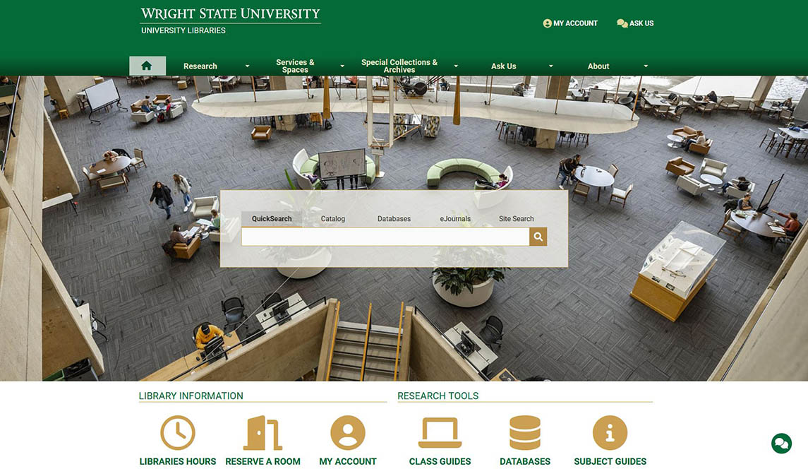 Screenshot of the Wright State University Libraries' website homepage featuring a photo of the 2nd floor of the Dunbar Library and a library search box